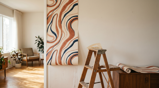 A photorealistic editorial interior photograph of a bright mid-century modern living room mid-wallpaper-installation, shot