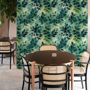 Dining area with a green leafy patterned wall, round table, and chairs.