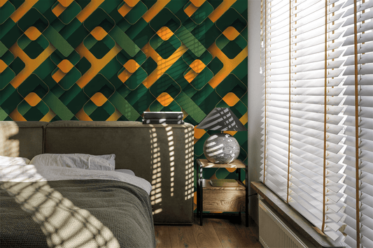 Modern bedroom with geometric green and yellow wall design and a bed.